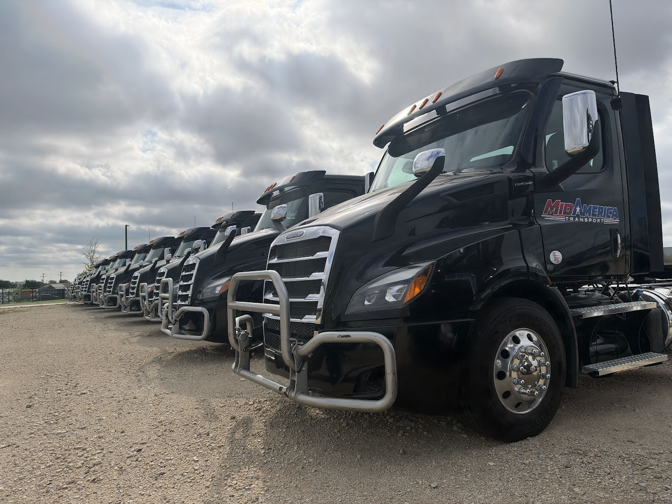 Actual MidAmerica Transport Freightliner fleet parked together