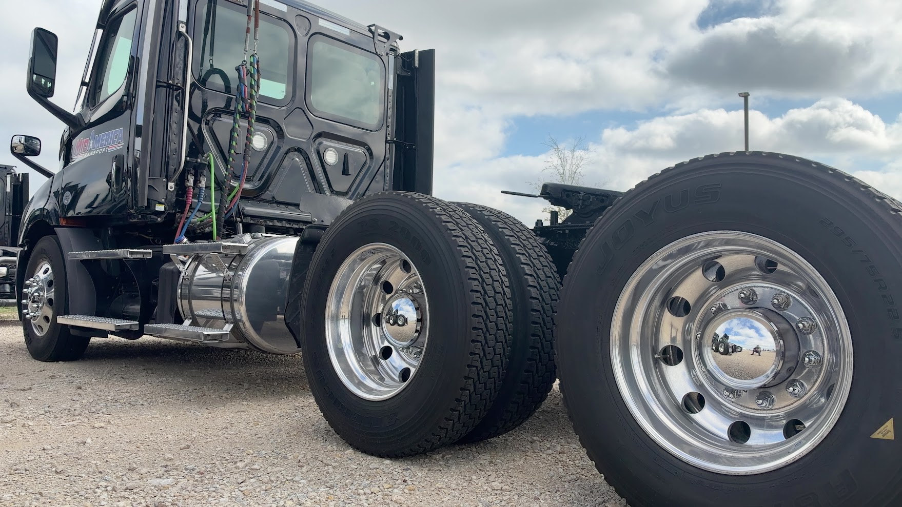 Actual rear wheels, tires and chassis of a MidAmerica tractor